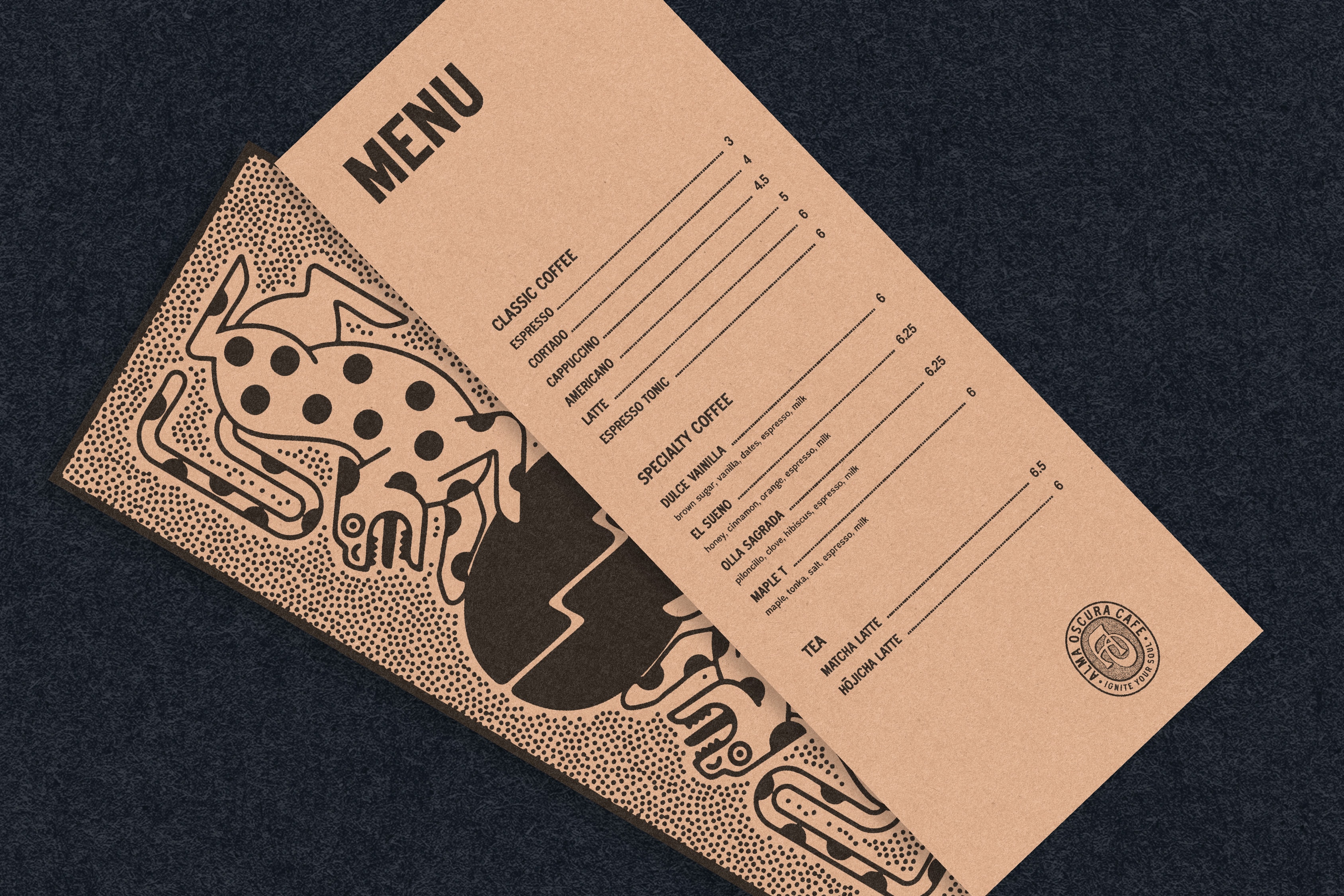 Alma Oscura — printed kraft menus on navy: the coffee and tea list on the front, the twin jaguar illustration on the back