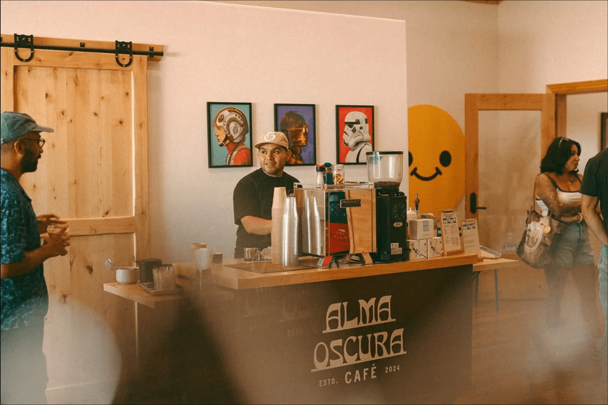 Alma Oscura Café — branded counter display at launch event