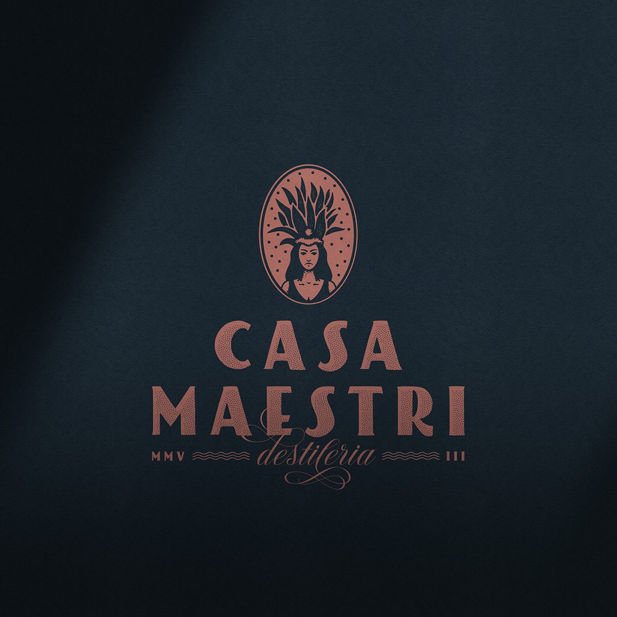 Casa Maestri — primary lockup in copper on deep navy: Mayahuel emblem above the Casa Maestri Destileria wordmark